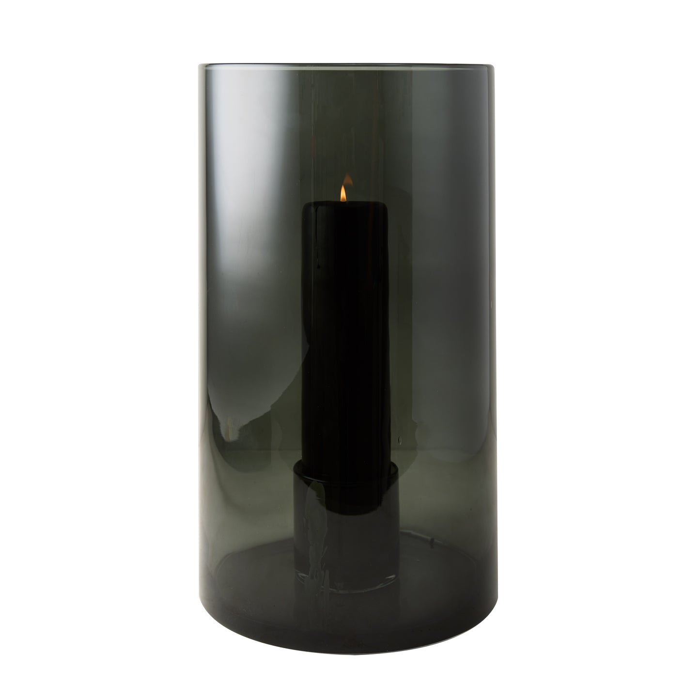 Large Diane Keaton + Hudson Grace smoke grey glass hurricane with lit black pillar candle.