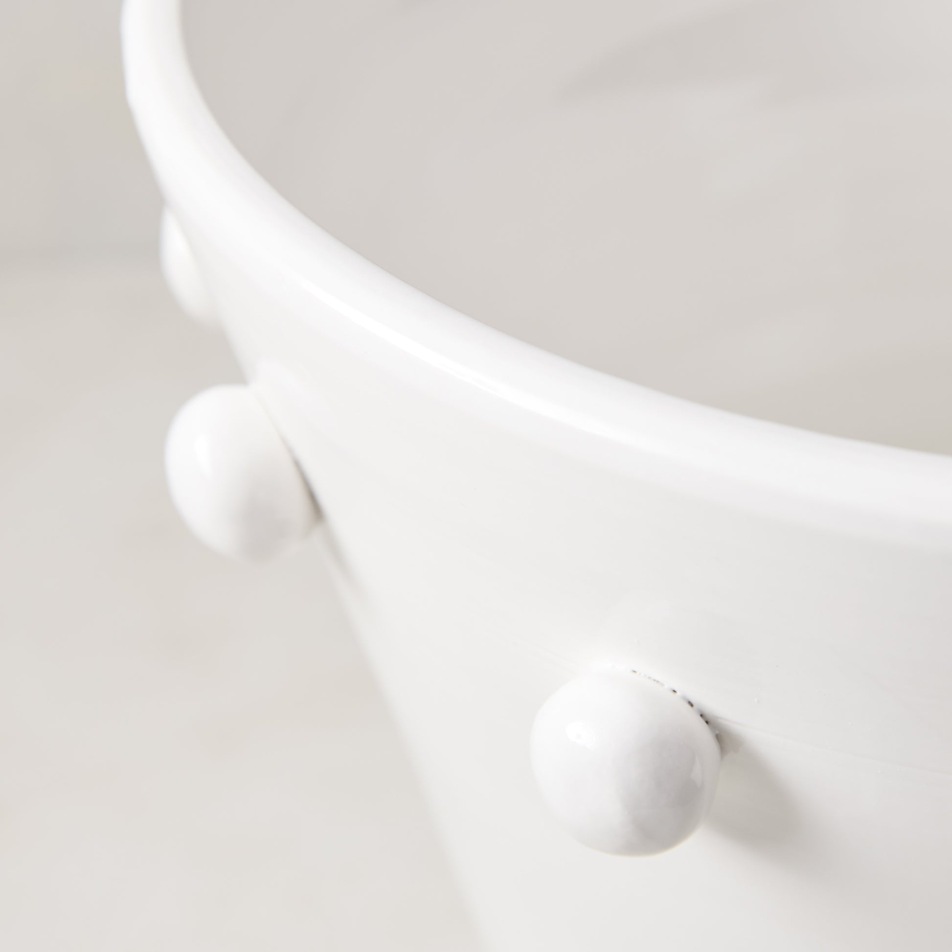 Diane Keaton + Hudson Grace white ceramic centerpiece with playful polka-dot design.