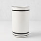 Diane Keaton + Hudson Grace white ceramic wine carafe with black stripes and rim.