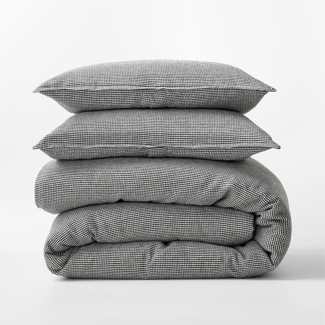 Diane Keaton + Hudson Grace black and white petite gingham linen duvet cover and shams, stacked.