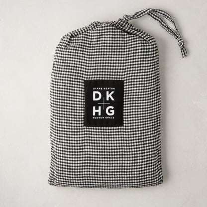 Diane Keaton + Hudson Grace petite gingham linen pillow shams in black and white drawstring bag.