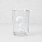 Clear glass everyday wine glass with a white question mark design.