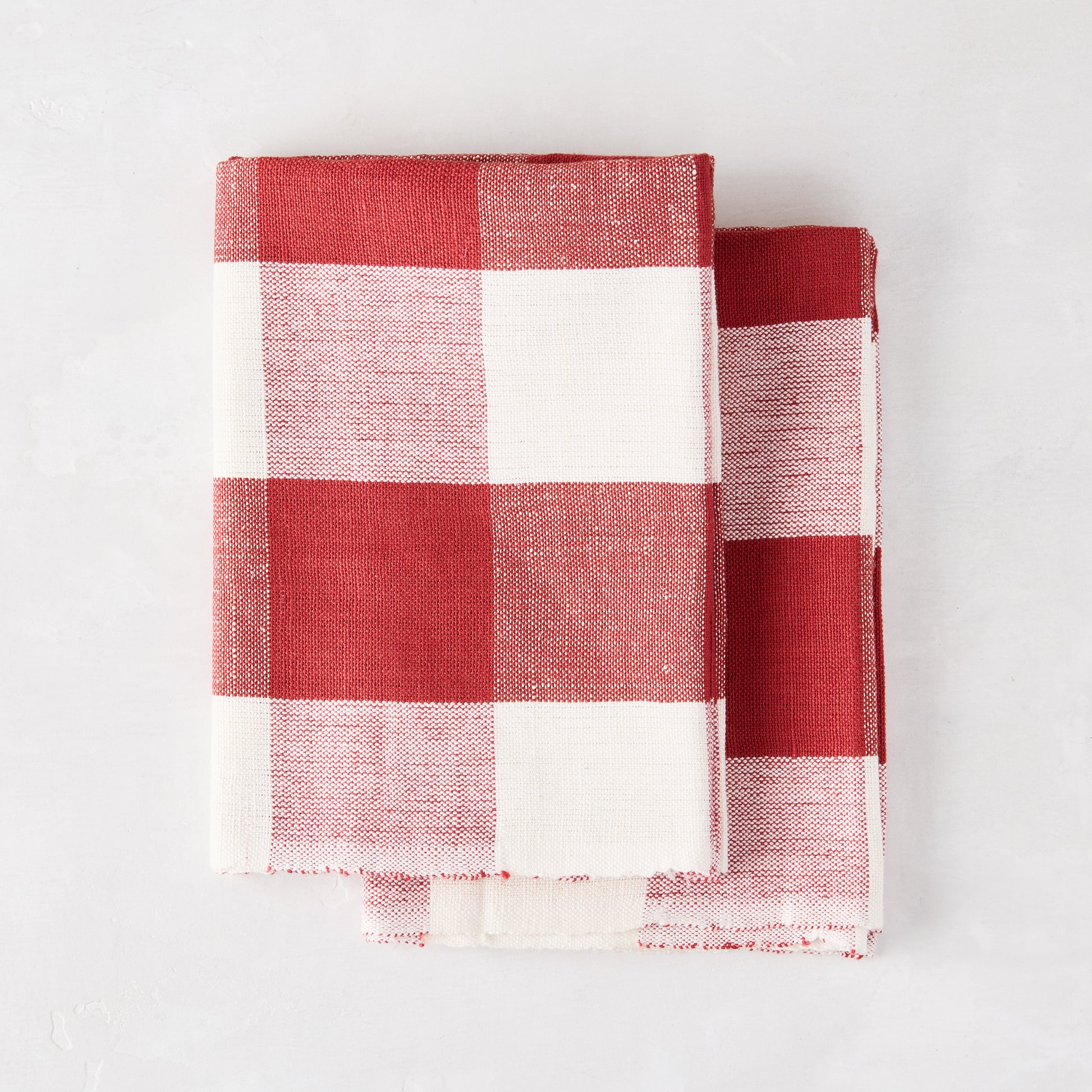 Diane Keaton + Hudson Grace Red Buffalo Check Hand Towels, cotton-linen blend, folded.