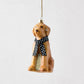 Hand-painted golden retriever Christmas ornament in resin and glass with a black and white polka dot ribbon.