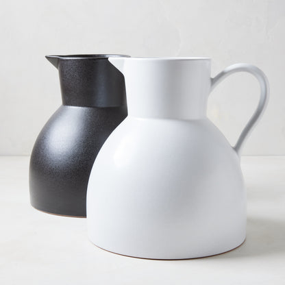 Diane Keaton + Hudson Grace sculptural black and white stoneware pitchers.