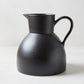 Diane Keaton + Hudson Grace sculptural black stoneware pitcher, oversized and handcrafted.