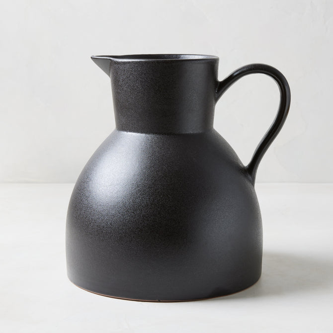 Diane Keaton + Hudson Grace sculptural black stoneware pitcher, oversized and handcrafted.