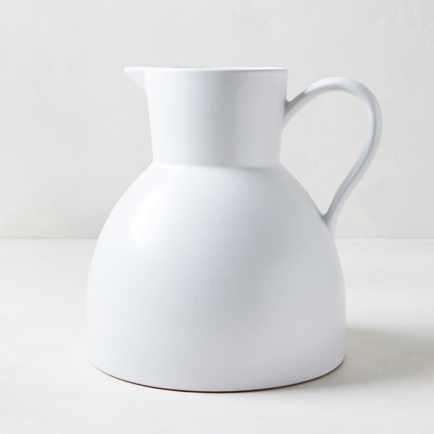 Diane Keaton + Hudson Grace sculptural white stoneware pitcher, large and decorative.