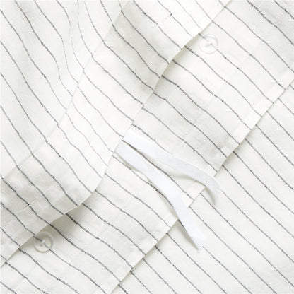 Diane Keaton + Hudson Grace Shirting Stripe Linen Duvet Cover, white with thin black stripes, button closure.