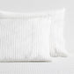 Diane Keaton + Hudson Grace white linen shams with thin black shirting stripes.