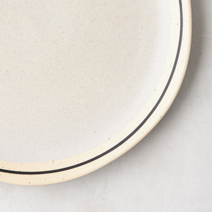 Diane Keaton + Hudson Grace Sketch Stoneware Dinner Plate, speckled natural stoneware with black line detail.