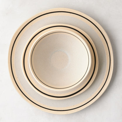 Diane Keaton + Hudson Grace Sketch stoneware dinner plate and bowl with black line detail.