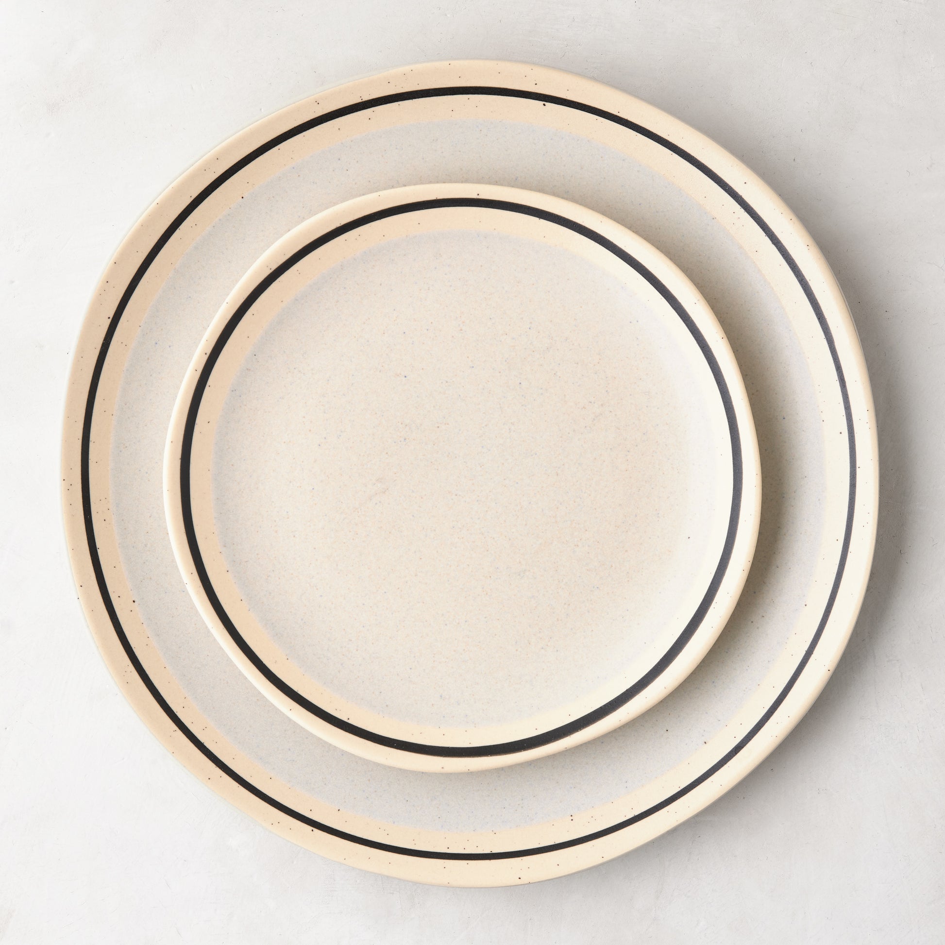 Diane Keaton + Hudson Grace Sketch Stoneware Dinner Plate, natural speckled finish with black line detail.