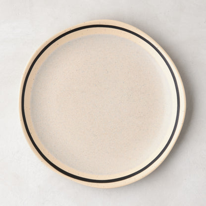 Diane Keaton + Hudson Grace speckled stoneware salad plate with black hand-drawn line.