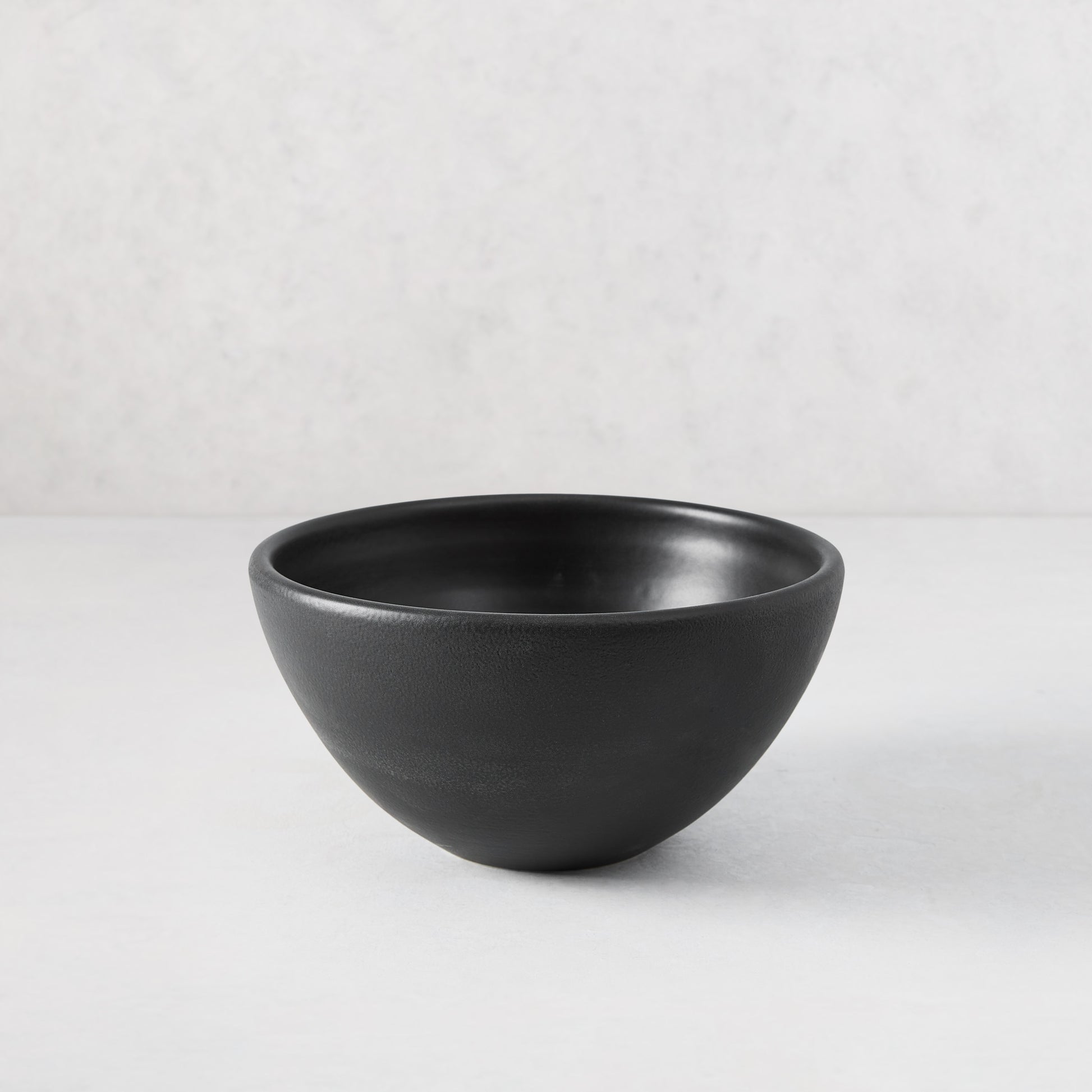 Small Diane Keaton + Hudson Grace modern matte black ceramic serve bowl.