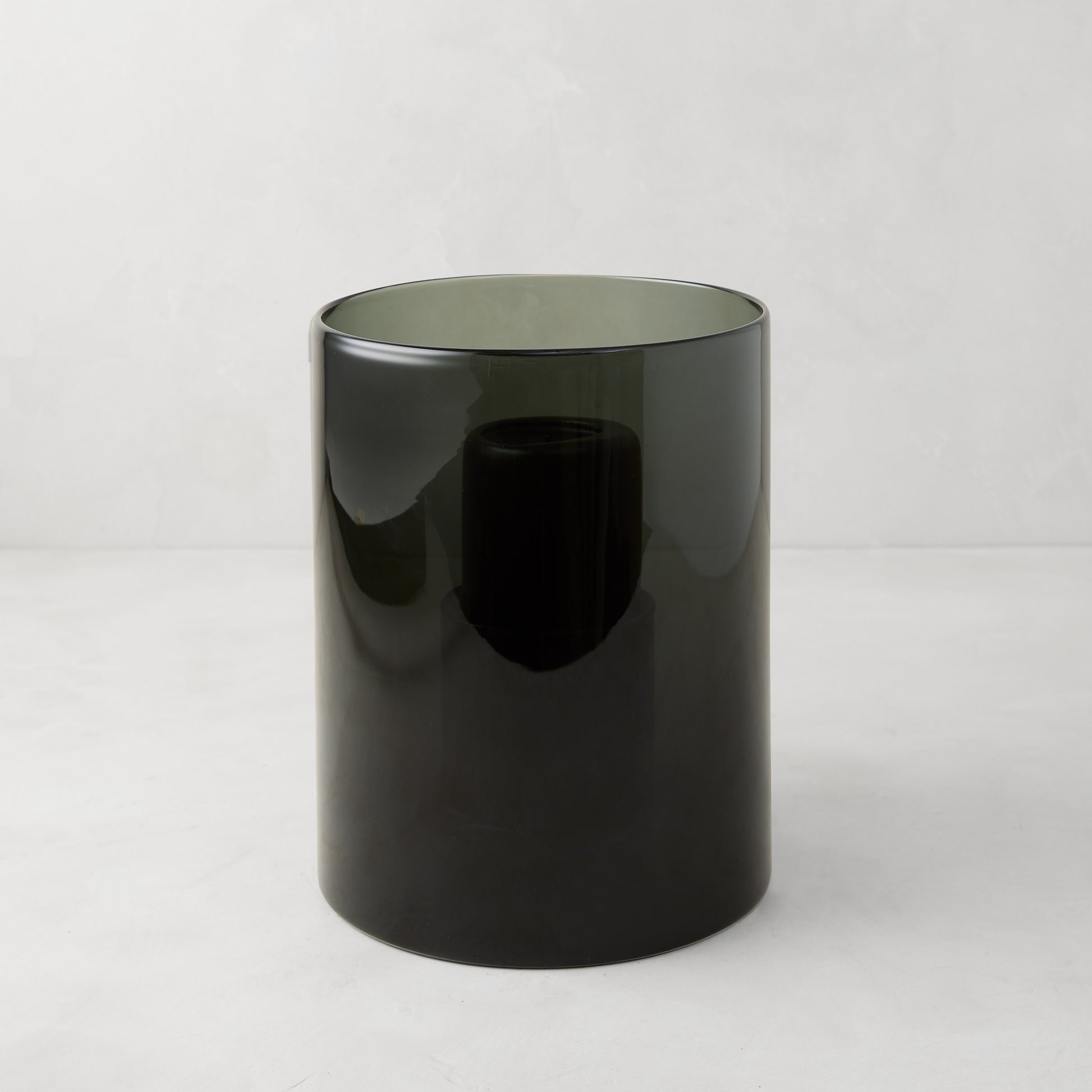 Small smoke grey hand-blown glass hurricane from the Diane Keaton x Hudson Grace Collection.