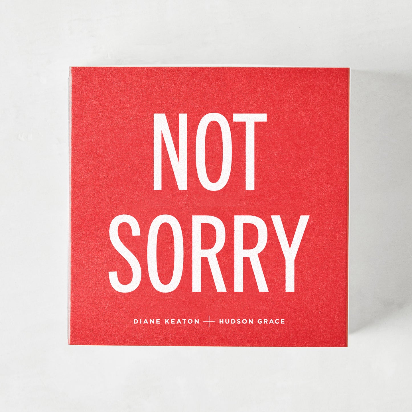 Diane Keaton + Hudson Grace "Sorry, Not Sorry" red boxed matches with white text.