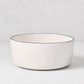 Diane Keaton + Hudson Grace Studio stoneware bowl with hand-painted black rim and textured white base.