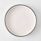 Diane Keaton + Hudson Grace Studio Black Rim Stoneware Salad Plate, textured white base, hand-painted black edge.