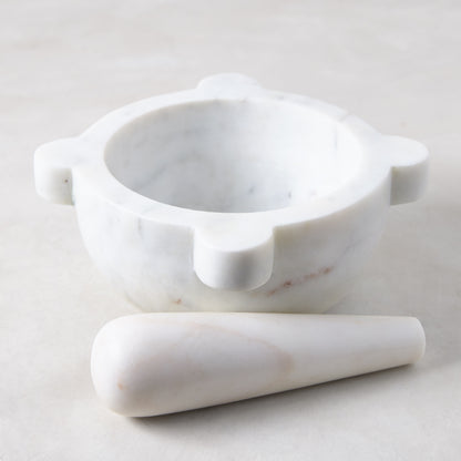 Diane Keaton + Hudson Grace white marble mortar and pestle with natural variations.