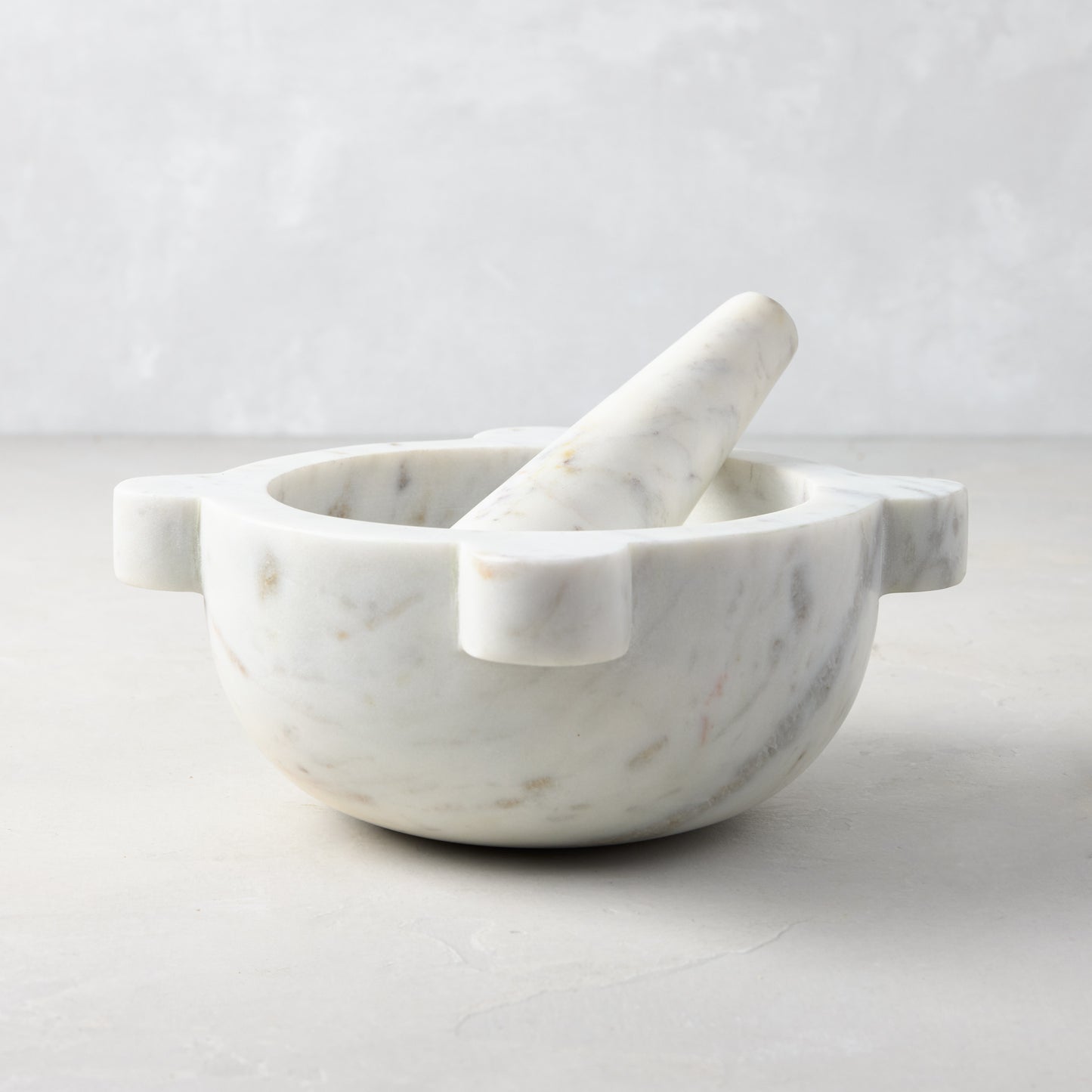 Diane Keaton + Hudson Grace white marble mortar and pestle, handcrafted with natural variations.