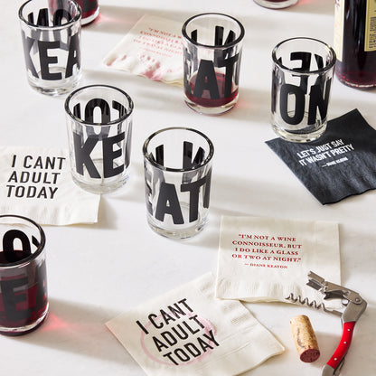Diane Keaton x Hudson Grace "Keaton Red" corkscrew with red handle, wine glasses, and themed napkins.