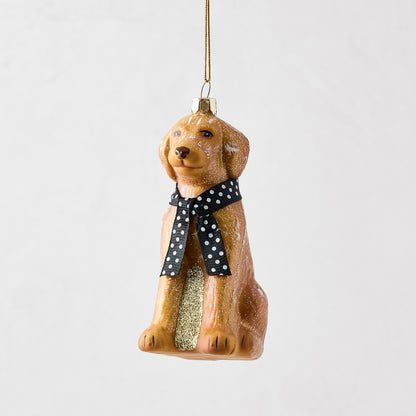 Hand-painted golden retriever Christmas ornament in resin and glass with a black and white polka dot ribbon.