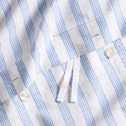 Dobby Blue Stripe Cotton Duvet Set with white buttons and ties, subtle geometric texture.