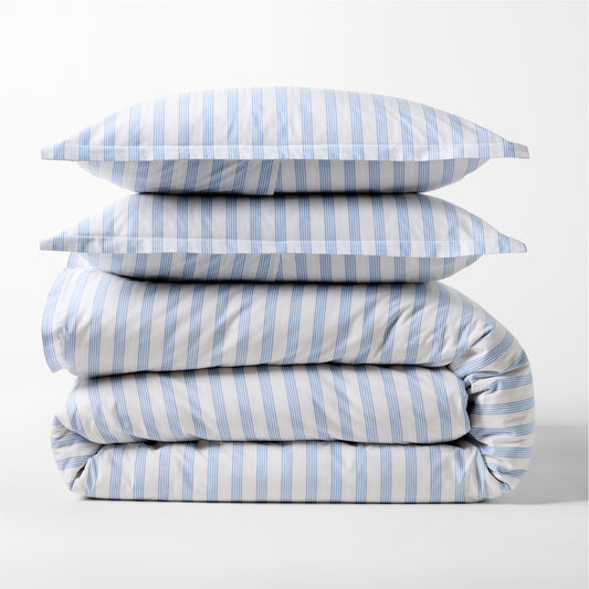 Dobby Blue Stripe Cotton Duvet Set, folded with two shams, featuring subtle textured blue and white stripes.