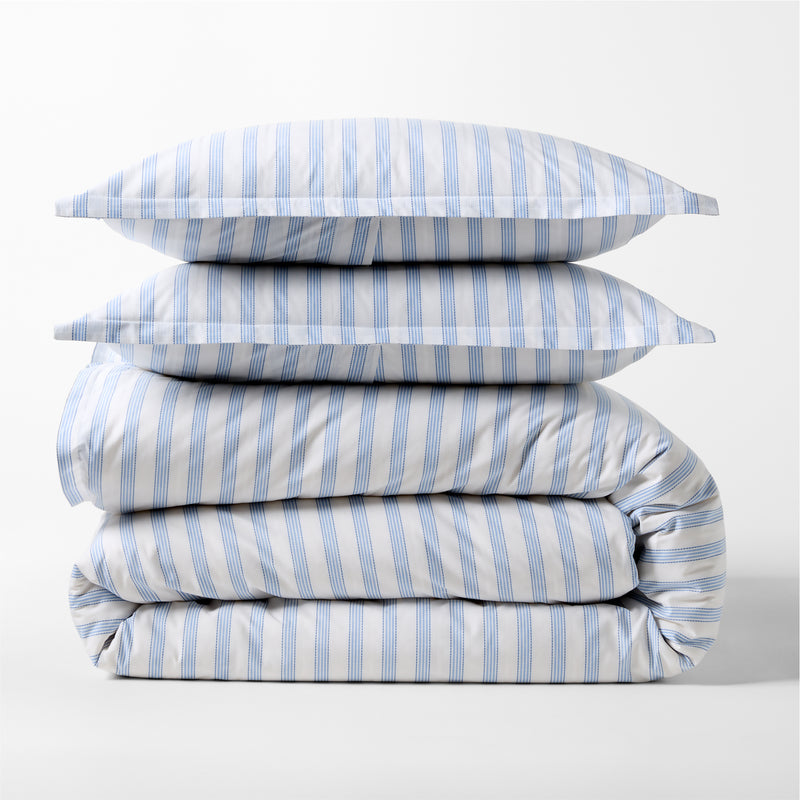Dobby Blue Stripe Cotton Duvet Set, folded with two shams, featuring subtle textured blue and white stripes.