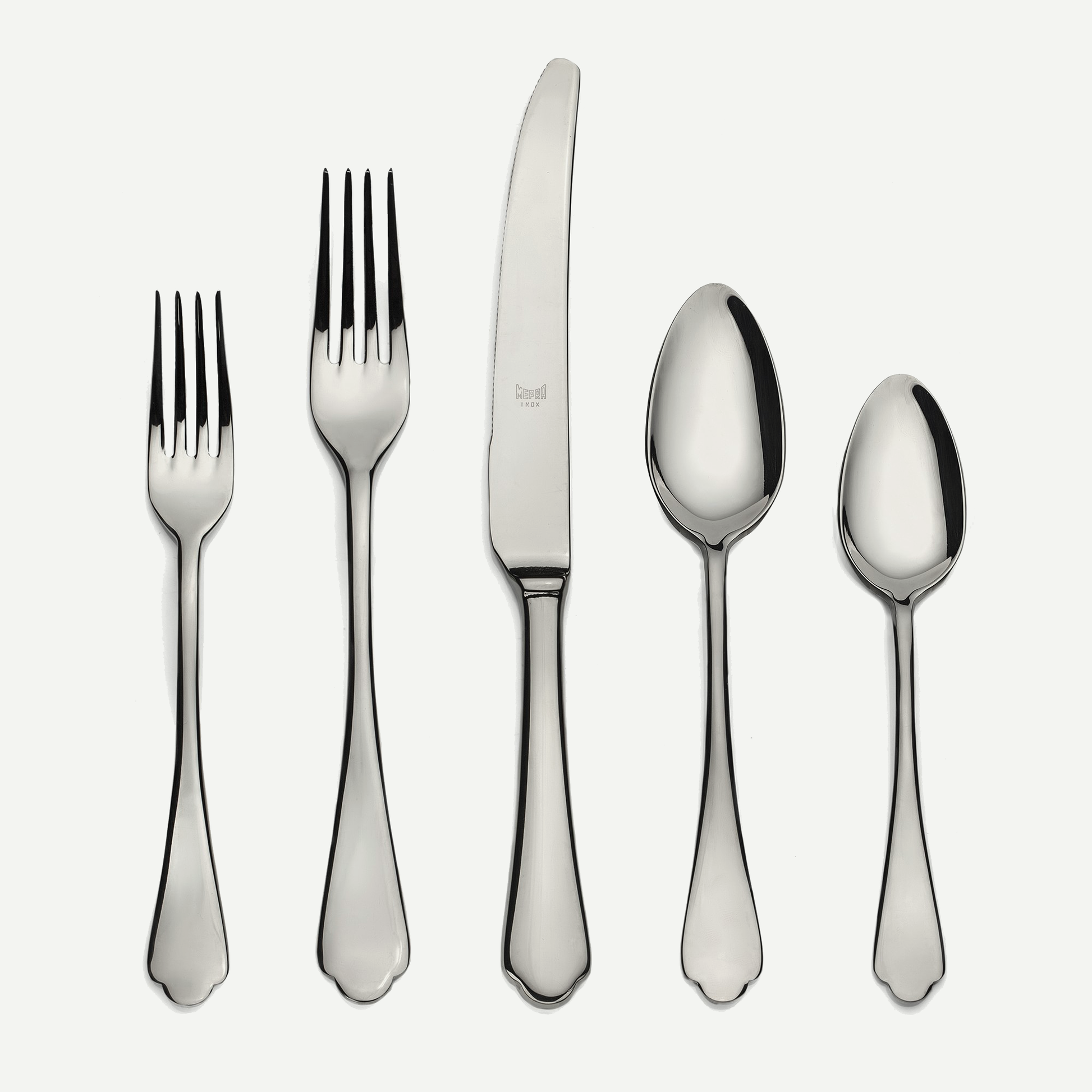 Dolce Vita 5-piece flatware set: shiny 18/10 stainless steel dinner knife, two forks, and two spoons.