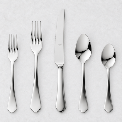 Dolce Vita 5-piece flatware set in polished 18/10 stainless steel with elegant Neo-Baroque design on a white background.