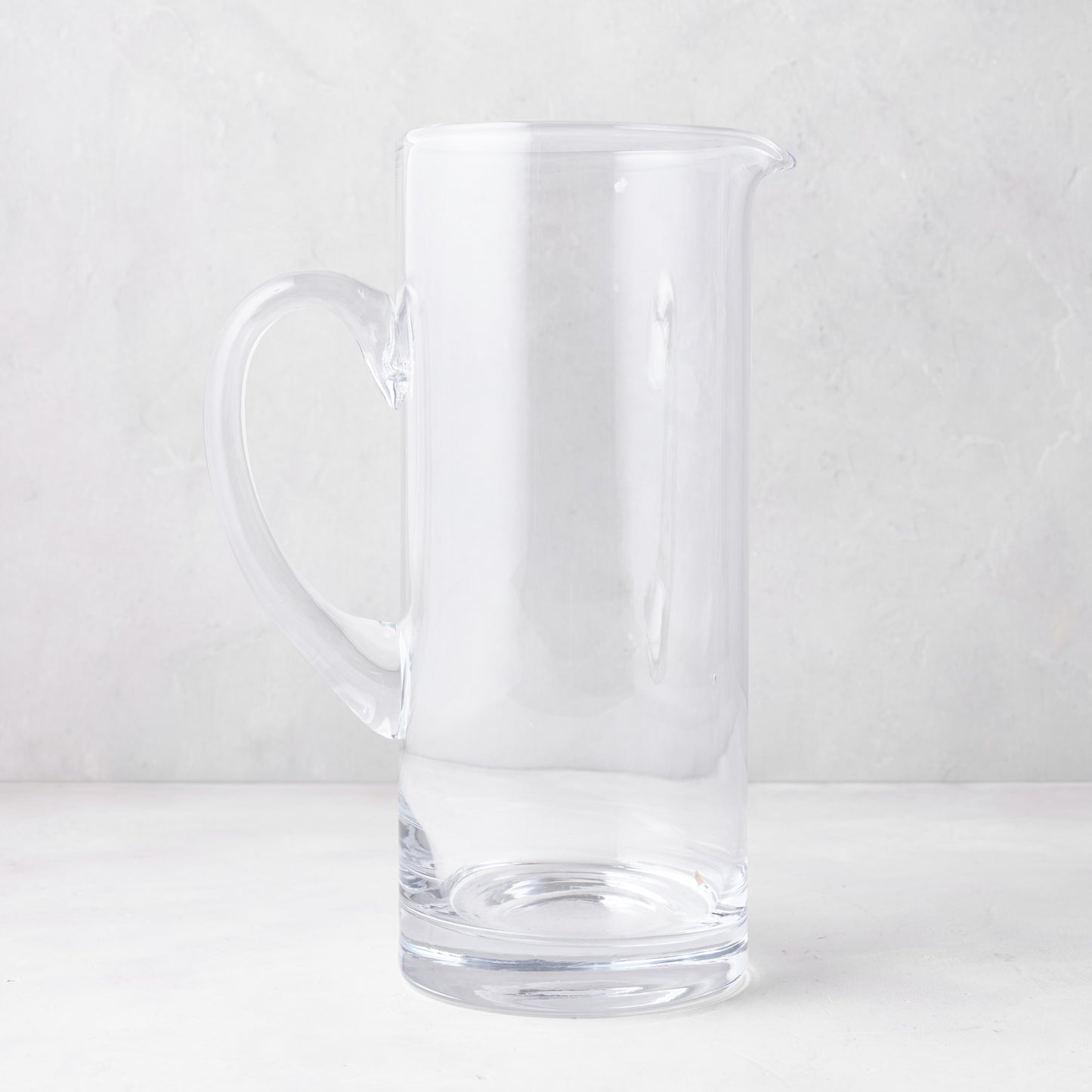 Downtown Tall Glass Bar Pitcher, clear, straight-sided, with handle and pour spout.