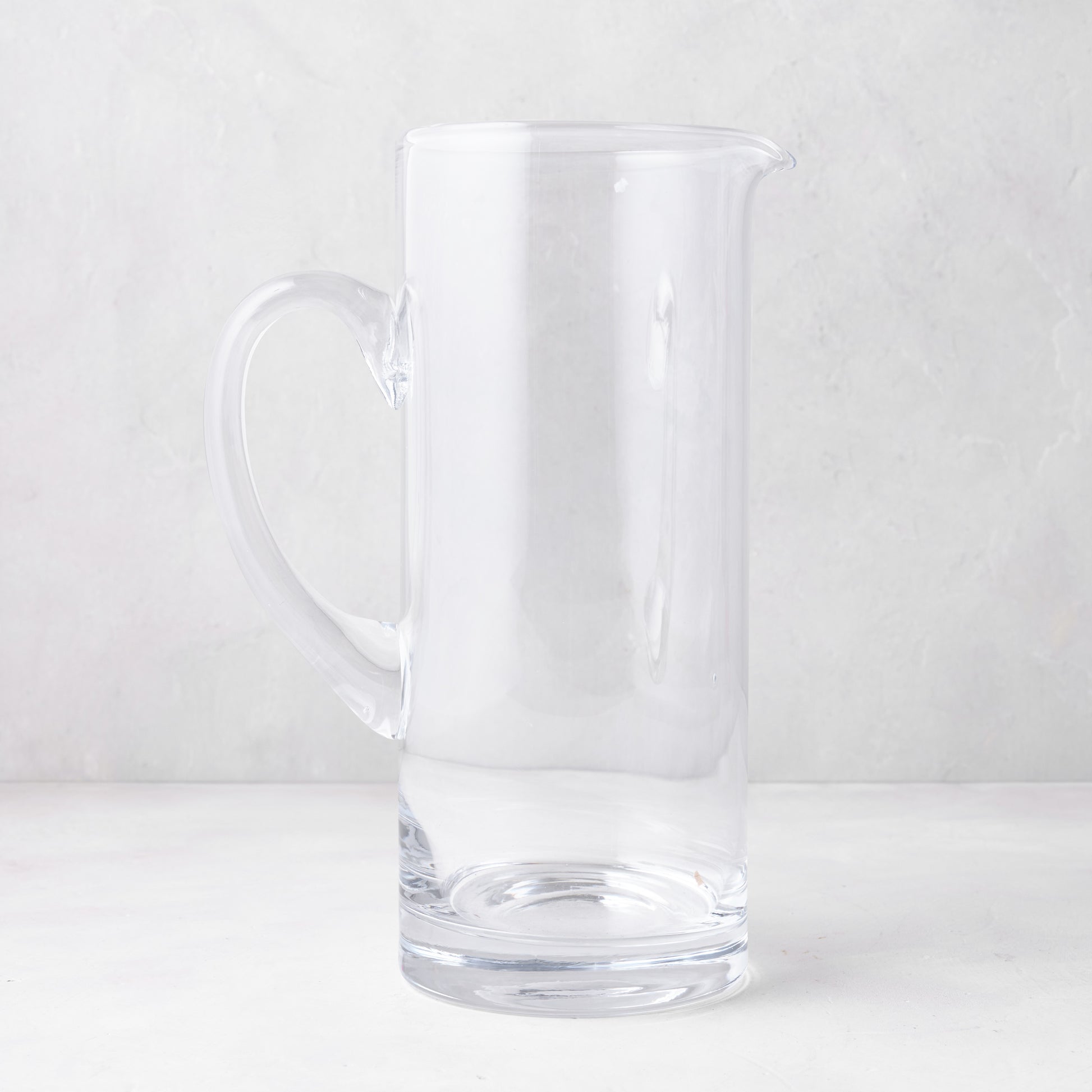 Downtown Tall Glass Bar Pitcher, clear, straight-sided, with handle and pour spout.