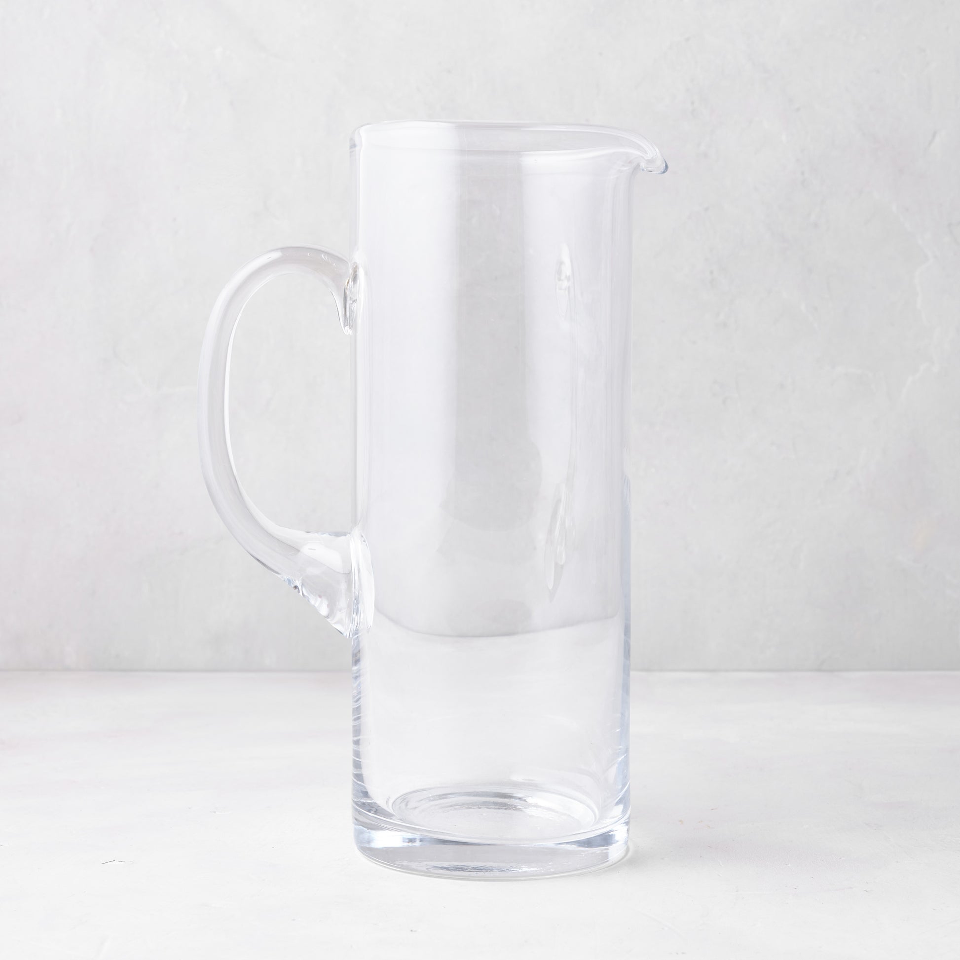 Downtown Tall Glass Bar Pitcher, clear, straight-sided design, with handle and pour spout.