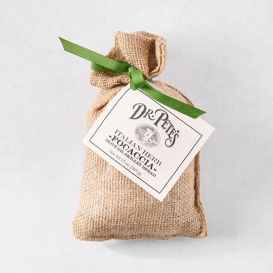 Dr. Pete's Italian Herb Focaccia Bread Mix in a rustic burlap bag with a green ribbon and white tag.