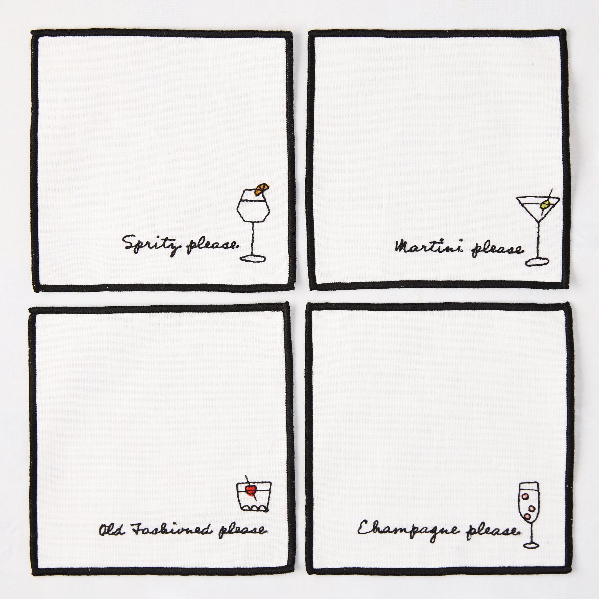 Set of 4 white cotton coasters with black embroidered cocktail designs: Spritz, Martini, Old Fashioned, Champagne.