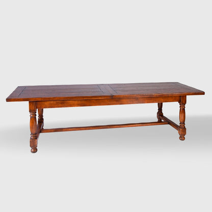 Hudson Grace Du Mas extendable oak dining table with a vintage patina finish and traditional turned legs