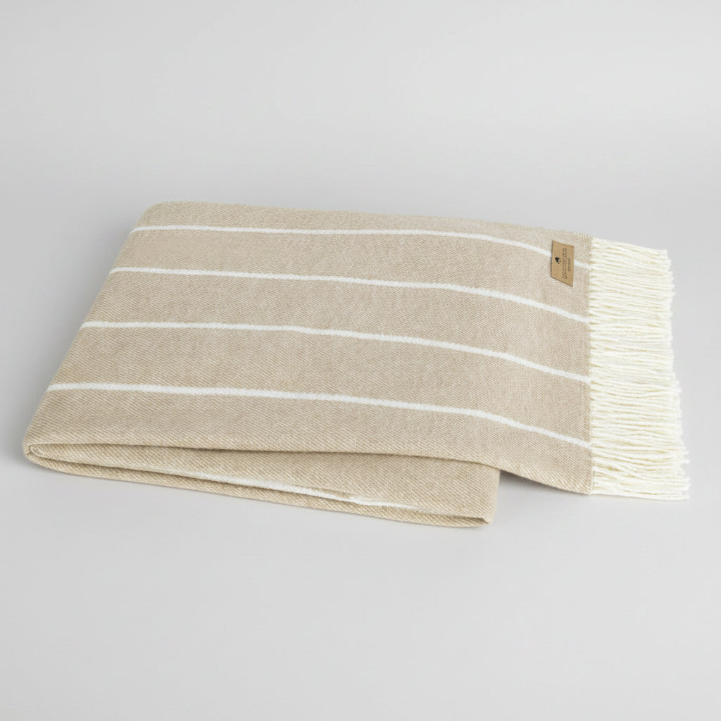 Dune Fiji Stripe Throw Blanket, light beige with white stripes, fringe, 50% cotton/50% acrylic.
