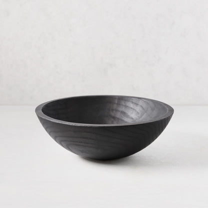 13" ebonized spalted wood bowl with dark, rich finish highlighting natural grain.