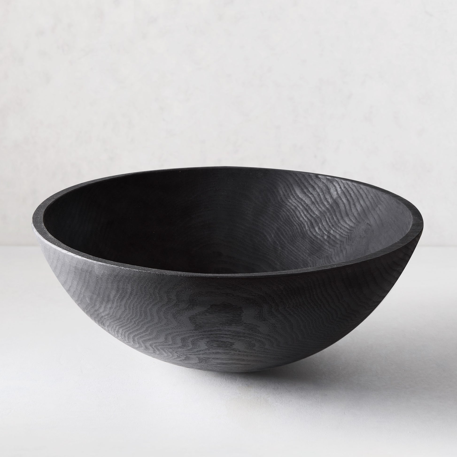 21" Ebonized Wood Bowl by Peterman's, dark finish highlighting wood grain.