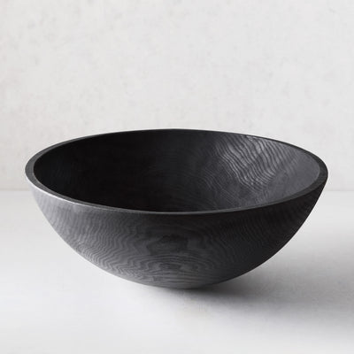 21" Ebonized Wood Bowl by Peterman's, dark finish highlighting wood grain.