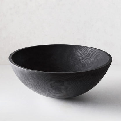 21" Ebonized Wood Bowl by Peterman's, dark finish highlighting wood grain.