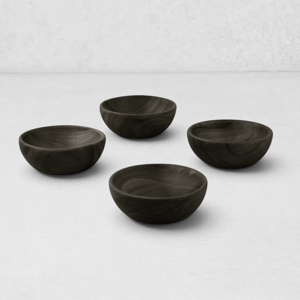 Set of 4 dark ebony teak wood pinch bowls, 2.5" Dia x 1"H, with visible wood grain.