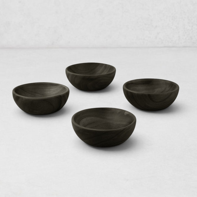 Set of 4 dark ebony teak wood pinch bowls, 2.5" Dia x 1"H, with visible wood grain.