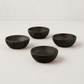 Set of 4 dark ebony teak wood pinch bowls, 2.5" Dia x 1"H, with visible wood grain.