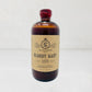 El Guapo Bloody Mary Mixer, 16.5oz amber glass bottle with a red cap and kraft paper label.