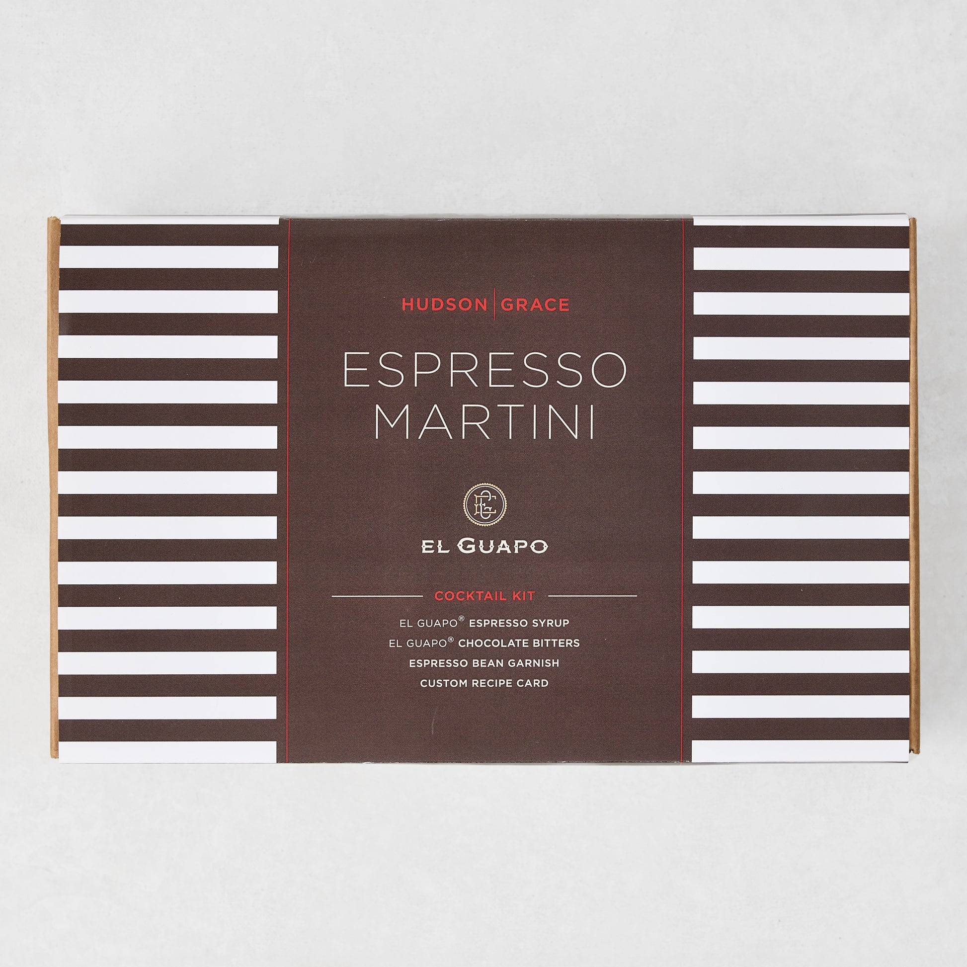 El Guapo Espresso Martini Cocktail Kit in a white and brown striped gift box with a dark brown label.