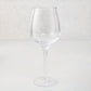 Elijah Large Scissor-Cut Wine Glass, 14 oz, clear thick air-blown glass with a rippled rim.