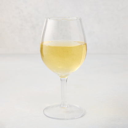 Elijah Small Scissor-Cut Wine Glass, 12 oz., clear air-blown glass with white wine.